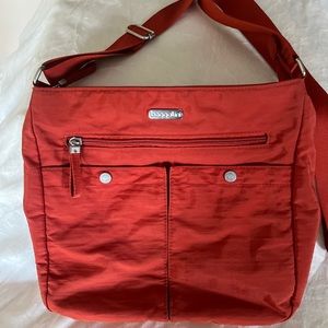 Baggalini crossbody bag. Burnt orange. Adjustable strap. Like new condition.